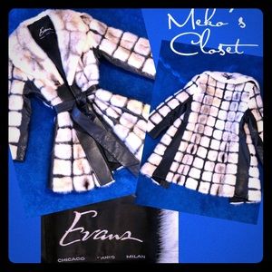 Vintage faux leather and fur coat by EVANS furs.